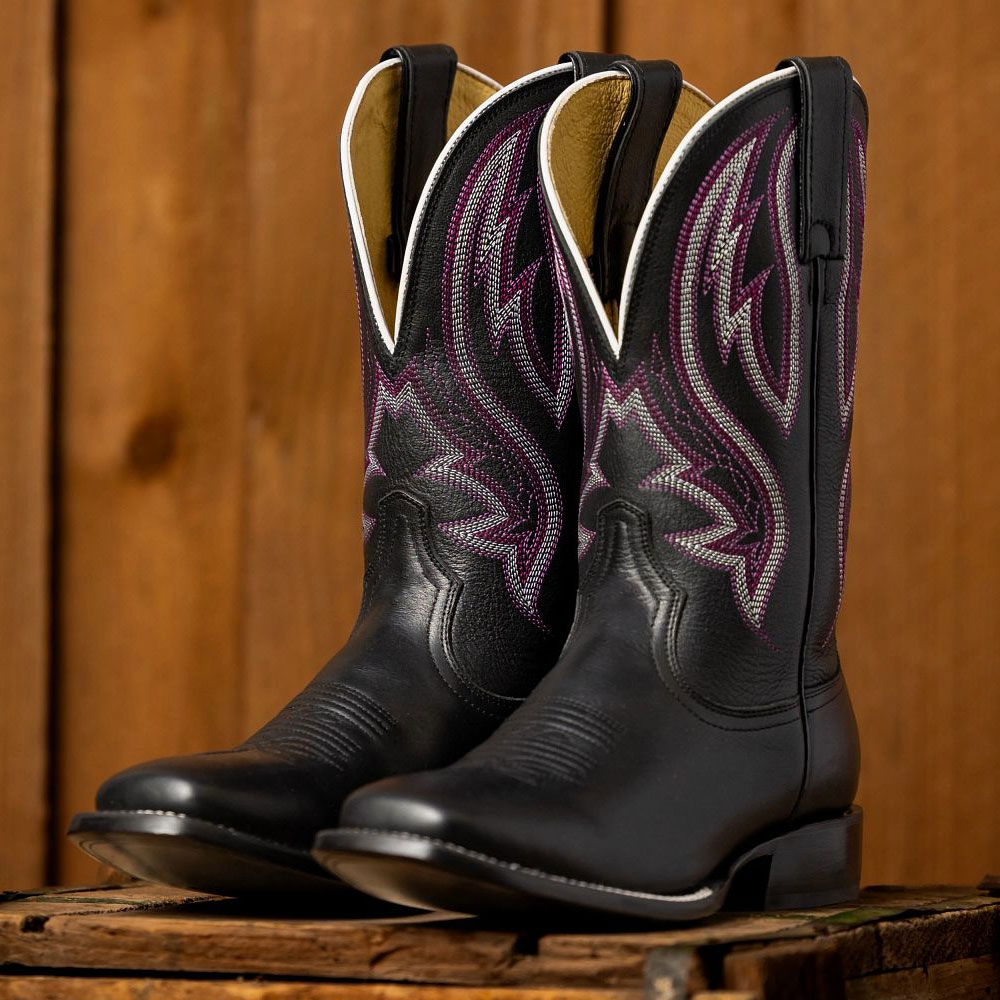 Featuring the Darcia 11” Western Boots in Black.
